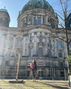 girl standing in front of building in berlin germany