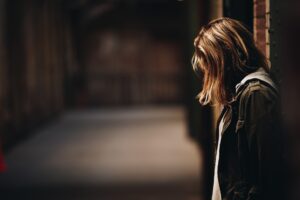 person alone in alley